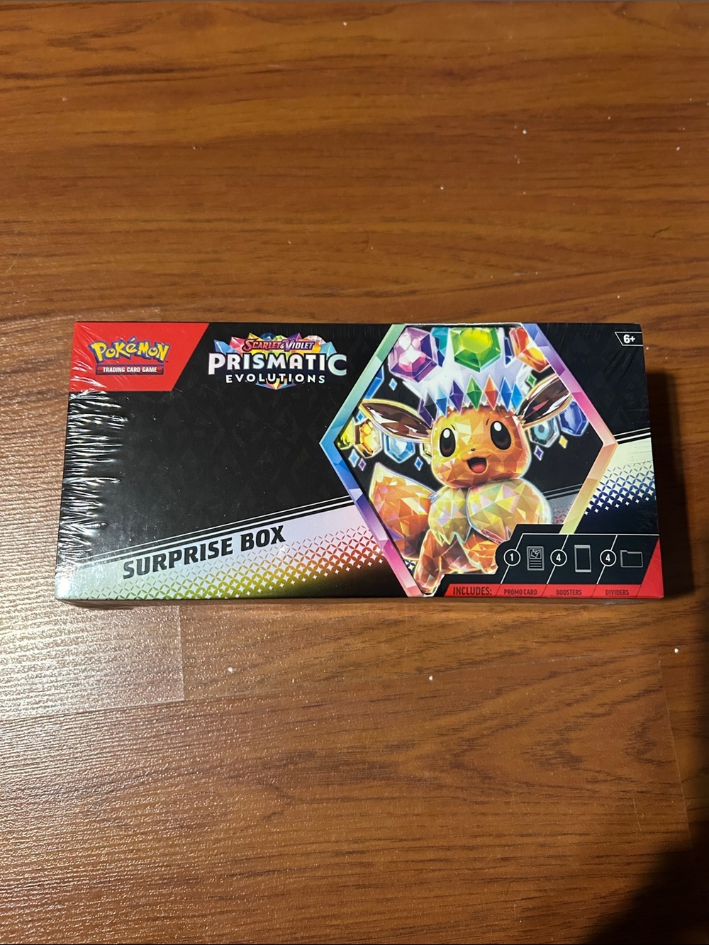 Pokemon Prismatic Evolutions Surprise Box - Black with Rainbow Accents